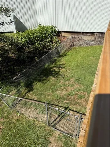 a view of balcony with furniture