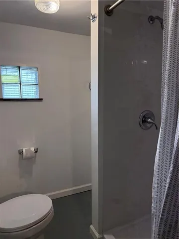 a close view of laundry room with a washer and dryer