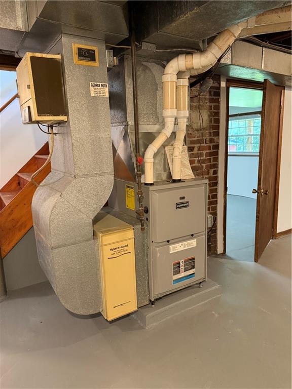 259 Rte 908 Natrona Heights, PA 15065 - Photo 29 of 29 a living room with furniture and a fireplace