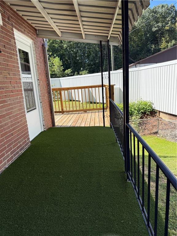 259 Rte 908 Natrona Heights, PA 15065 - Photo 4 of 29 a view of a porch with a backyard