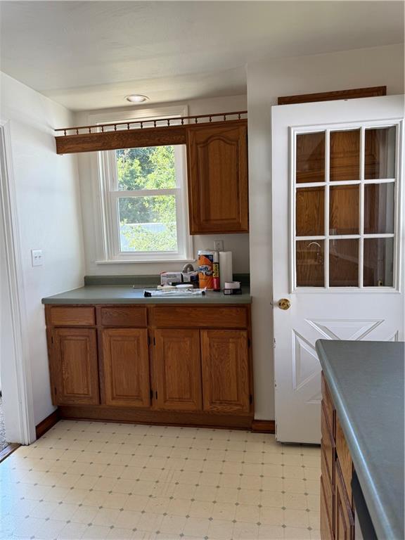 259 Rte 908 Natrona Heights, PA 15065 - Photo 10 of 29 a kitchen with a window a sink and a cabinets