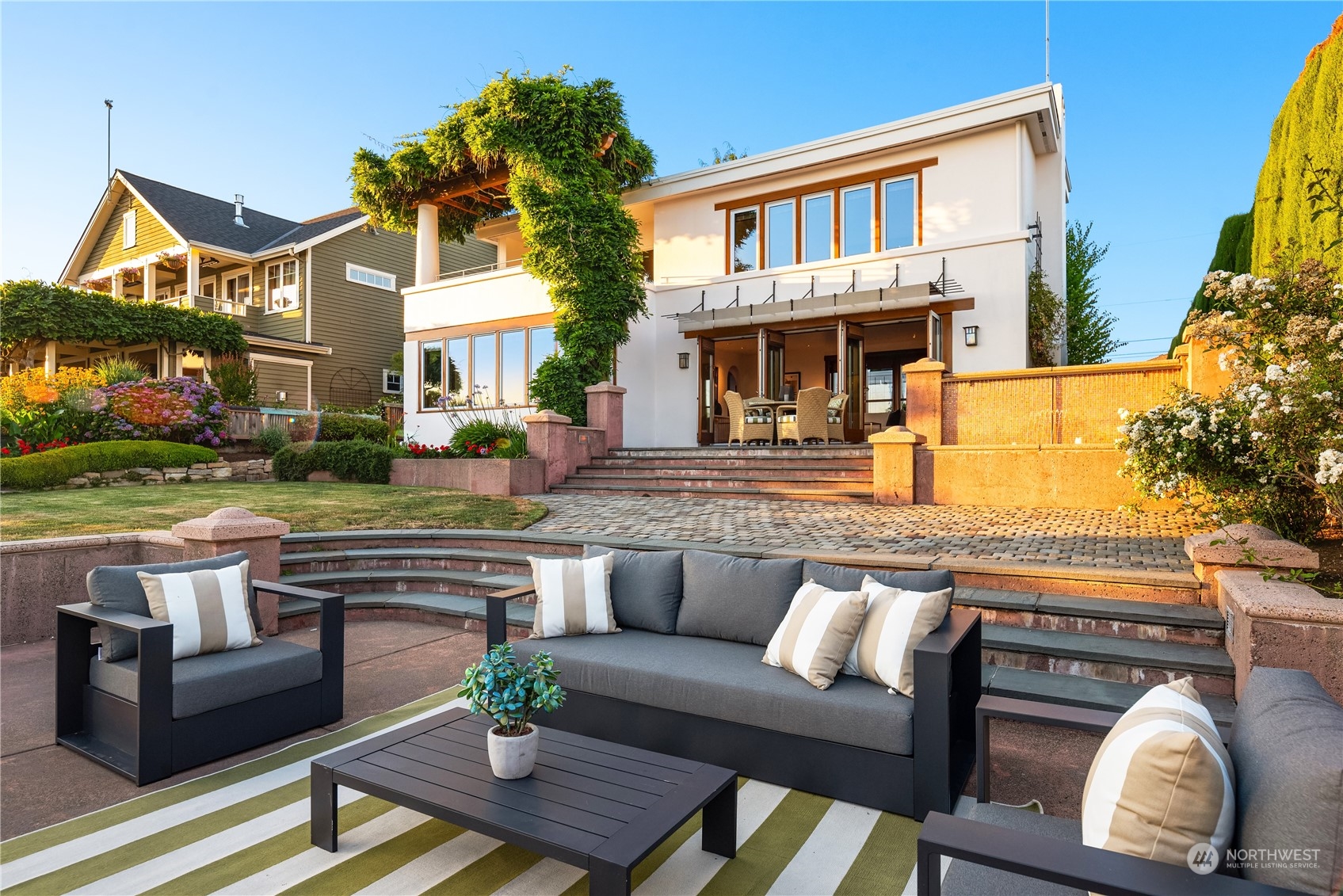 11287 Marine View Drive Southwest Seattle, WA 98146 - Photo 11 of 40 a view of a house and a couches in a patio