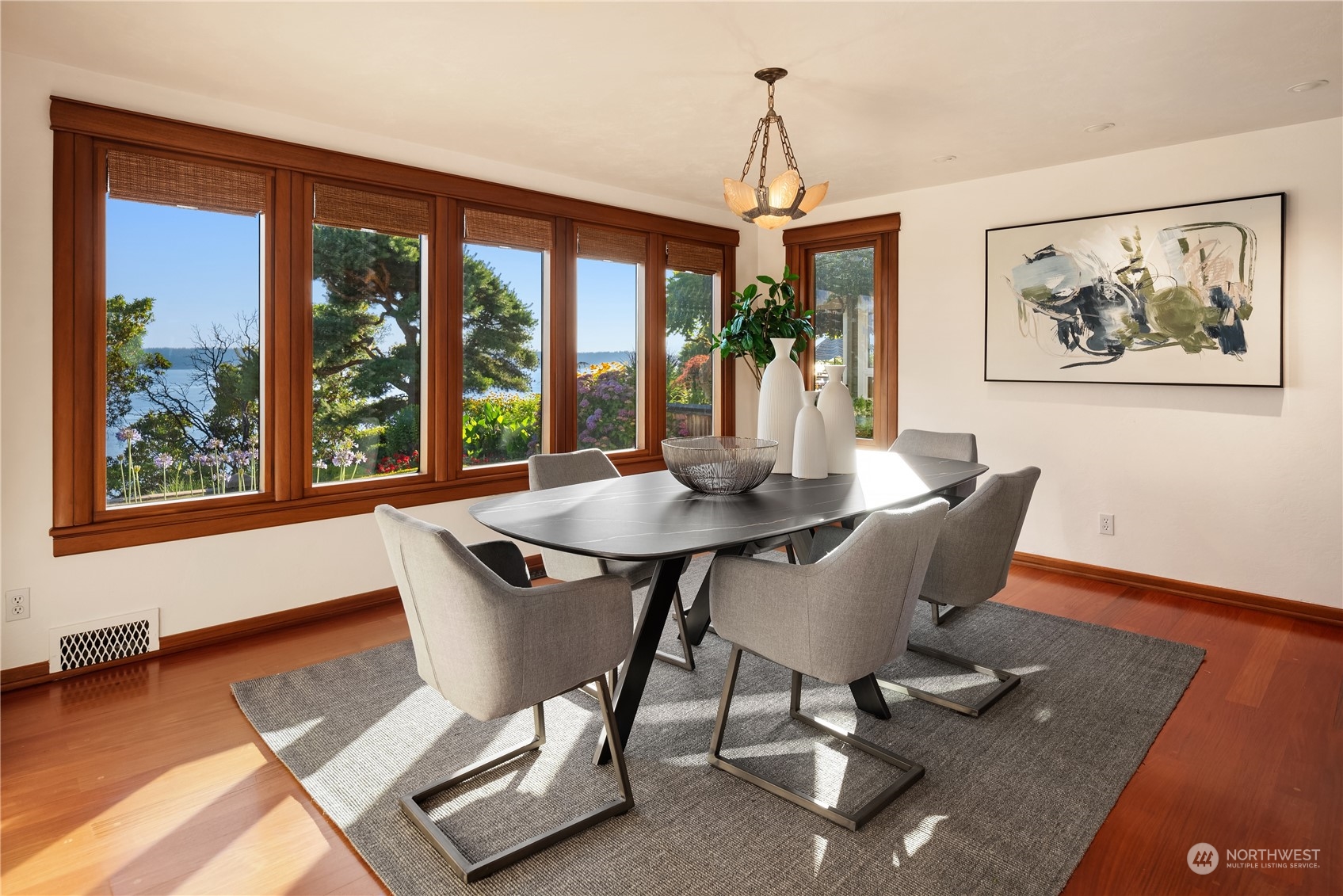 11287 Marine View Drive Southwest Seattle, WA 98146 - Photo 12 of 40 a view of a dining room with furniture window and wooden floor
