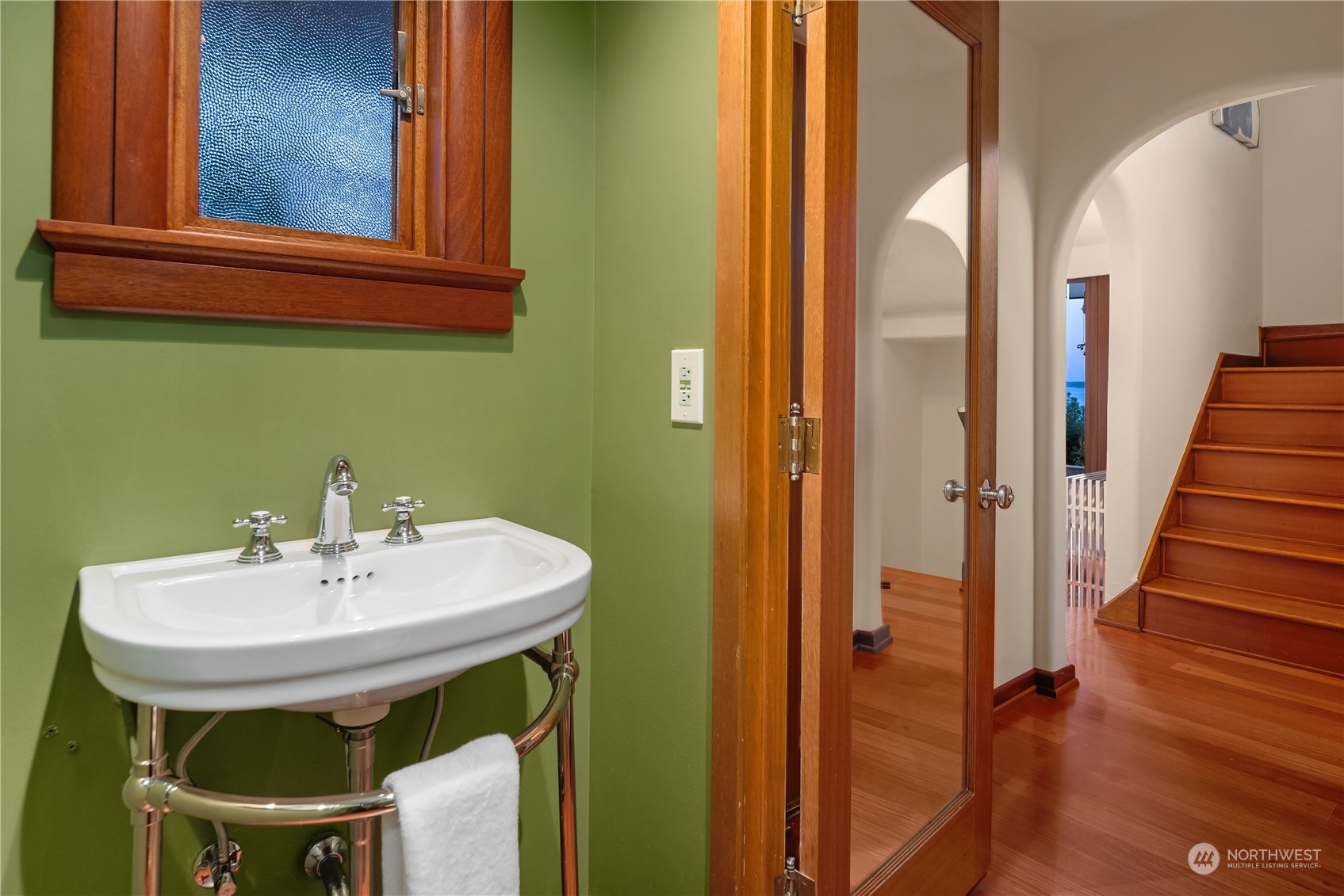 11287 Marine View Drive Southwest Seattle, WA 98146 - Photo 21 of 40 a bathroom with a sink and a mirror