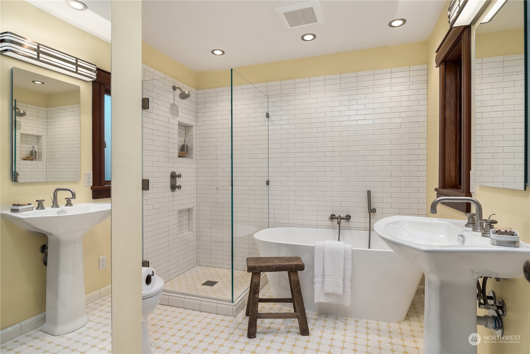 11287 Marine View Drive Southwest Seattle, WA 98146 - Photo 27 of 40 a bathroom with a sink double vanity and shower