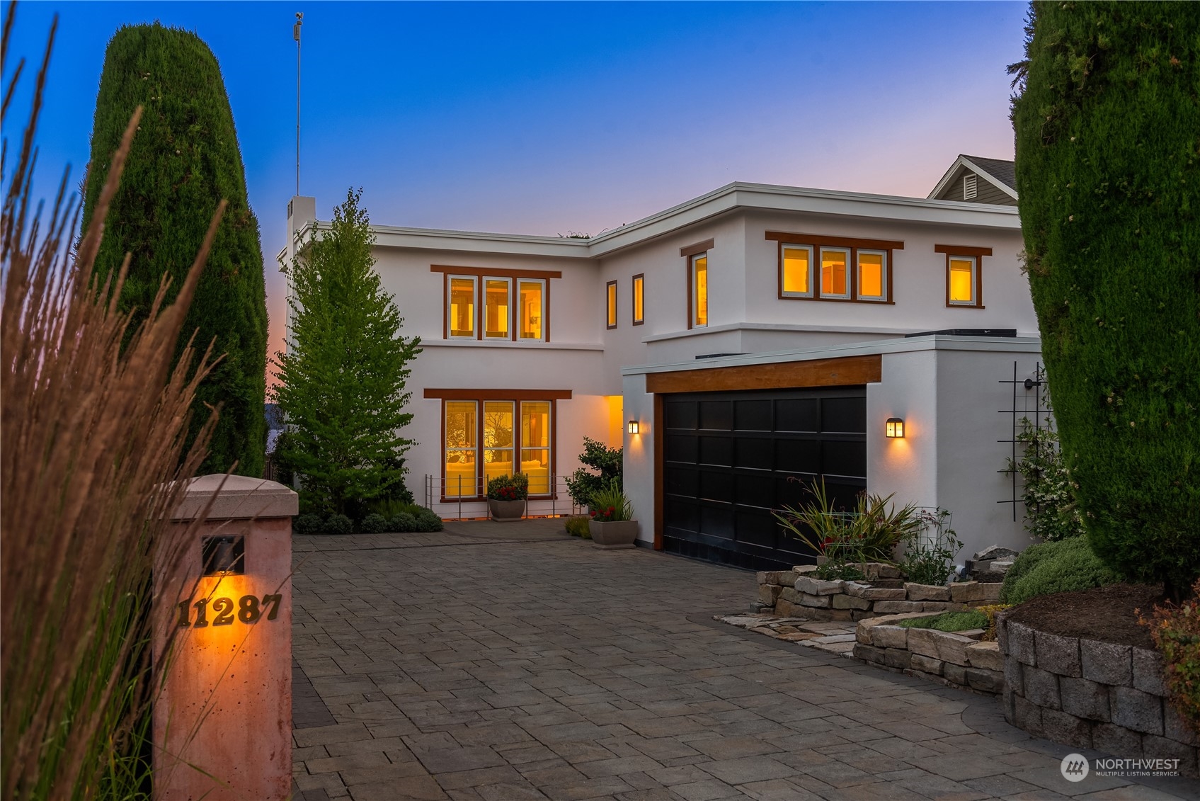 11287 Marine View Drive Southwest Seattle, WA 98146 - Photo 40 of 40 a front view of a house with a yard