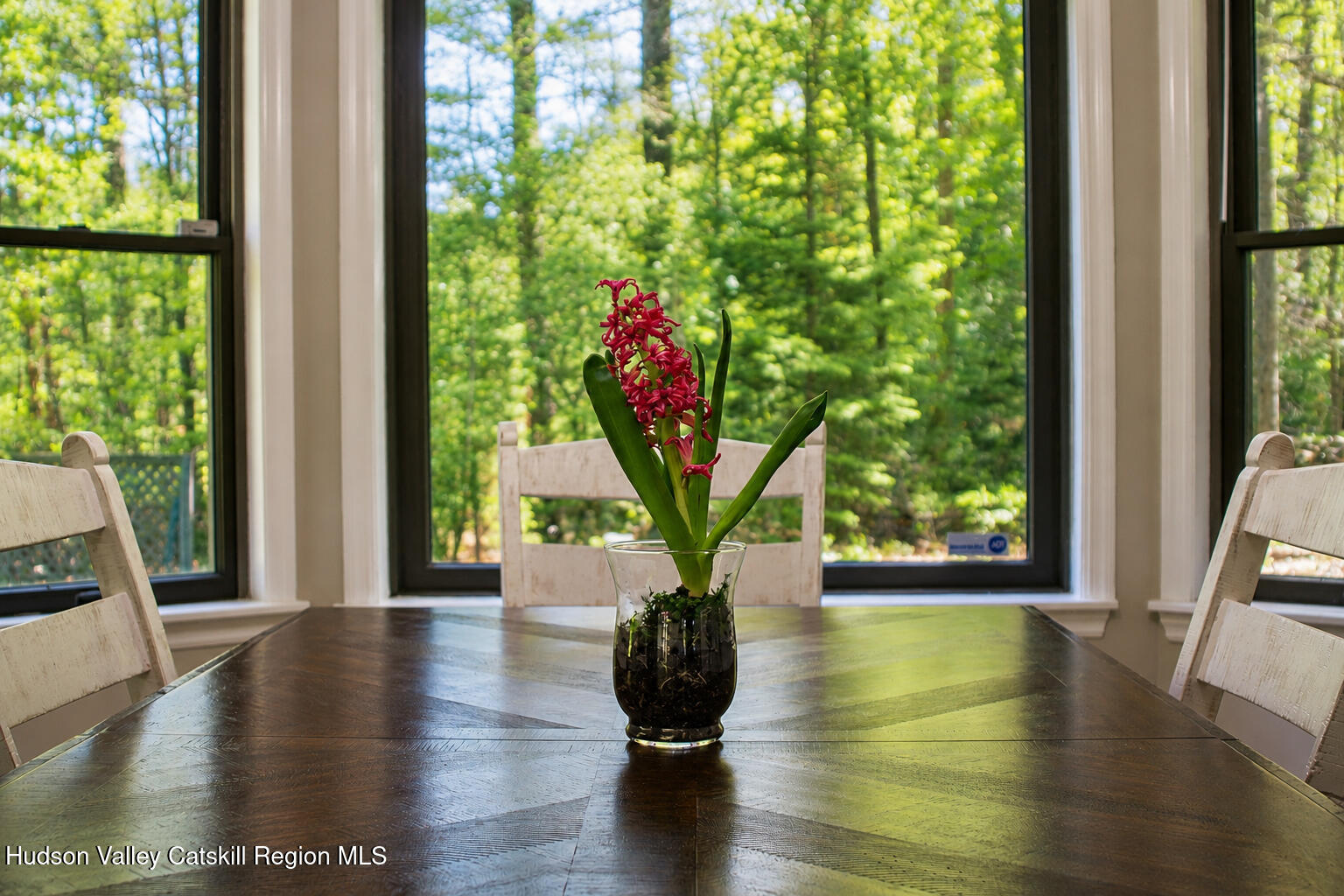 25 Old Farm Road Shokan, NY 12481 - Photo 4 of 22 a view of a living room and floor to ceiling windows with wooden floor