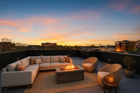 an outdoor living room with furniture