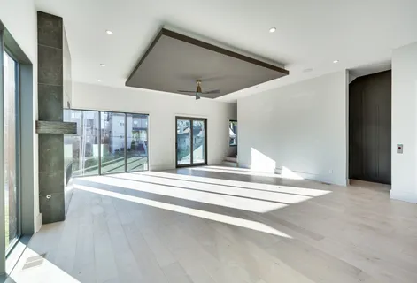 a view of a balcony with two chairs