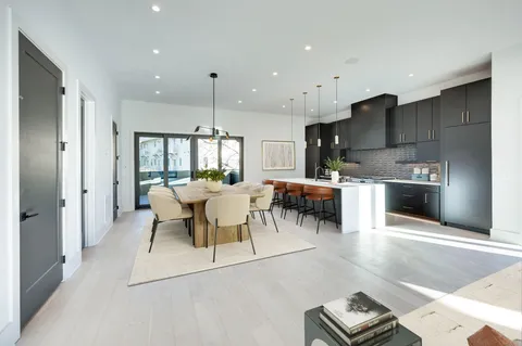 a view of balcony with wooden floor