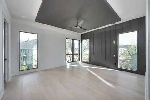 a kitchen with cabinets and stainless steel appliances