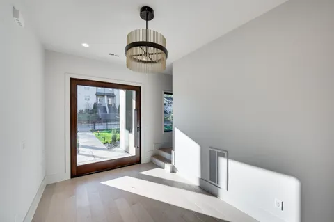 a view of a room with a large window