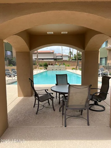 a view of a workspace with furniture