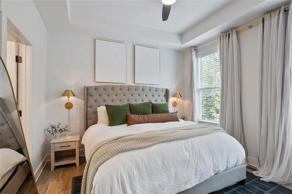 1081 Crest Circle Southeast Atlanta, GA 30312 - Photo 12 of 26 a bedroom with a bed and window