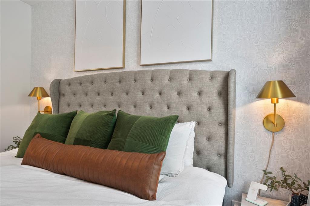 1081 Crest Circle Southeast Atlanta, GA 30312 - Photo 15 of 26 a living room with a couch and a potted plant