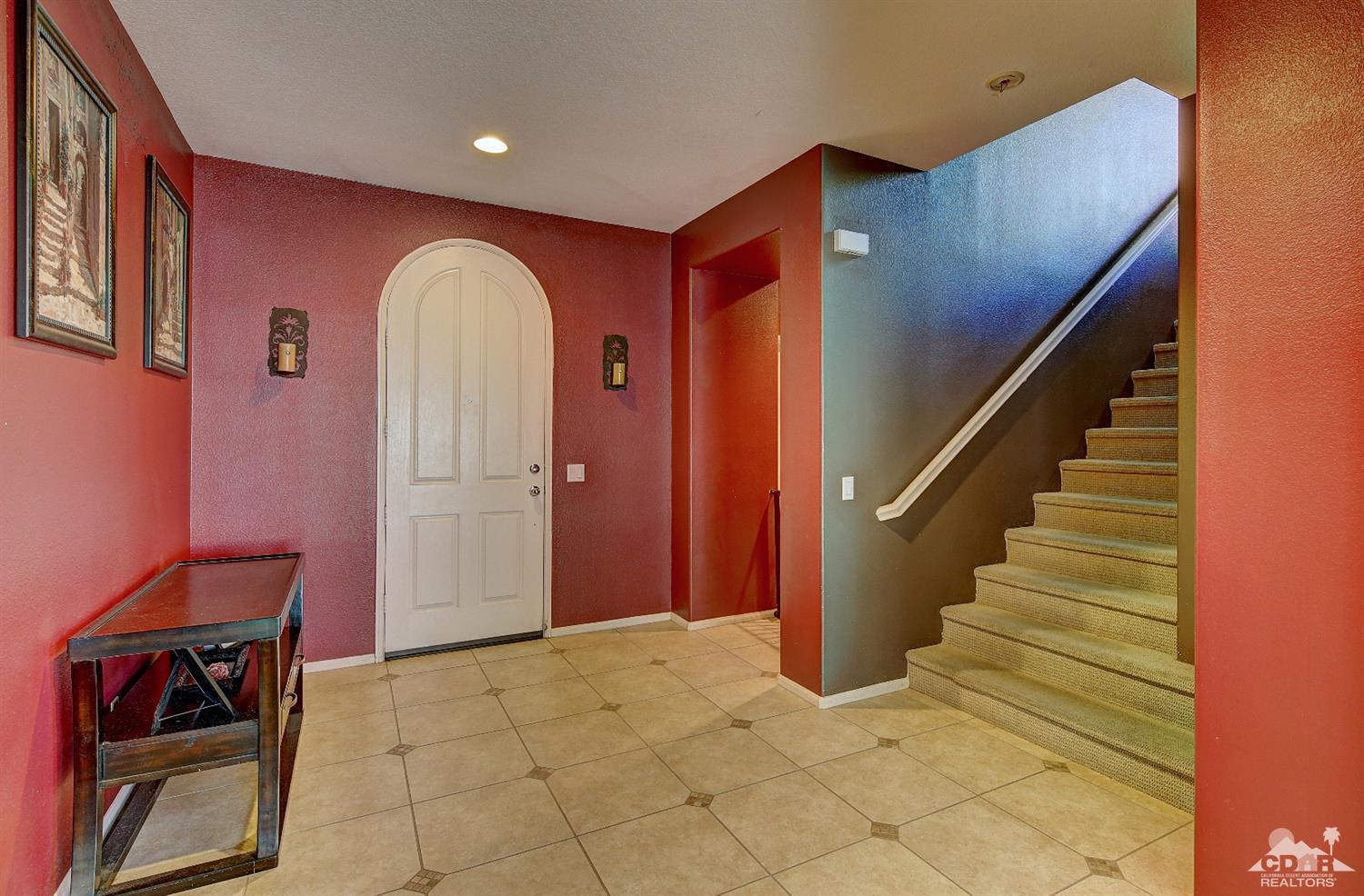 82734 Mount Riley Drive Indio, CA 92203 - Photo 3 of 26 a view of an entryway with staircase