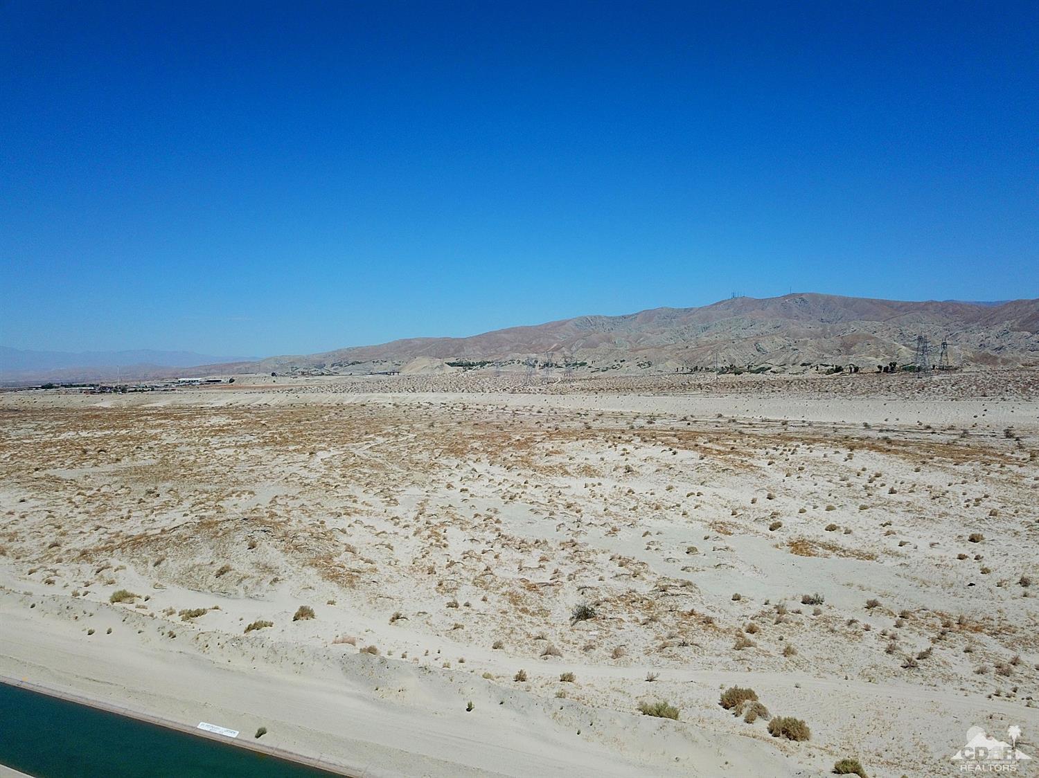 82734 Mount Riley Drive Indio, CA 92203 - Photo 24 of 26 a view of ocean beach and mountain