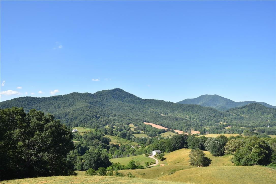 2854 Rabbit Skin Road Waynesville, NC 28785 - Photo 15 of 29 a view of a town with mountains in the background