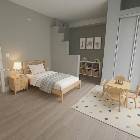 a bedroom with a bed and a cabinets