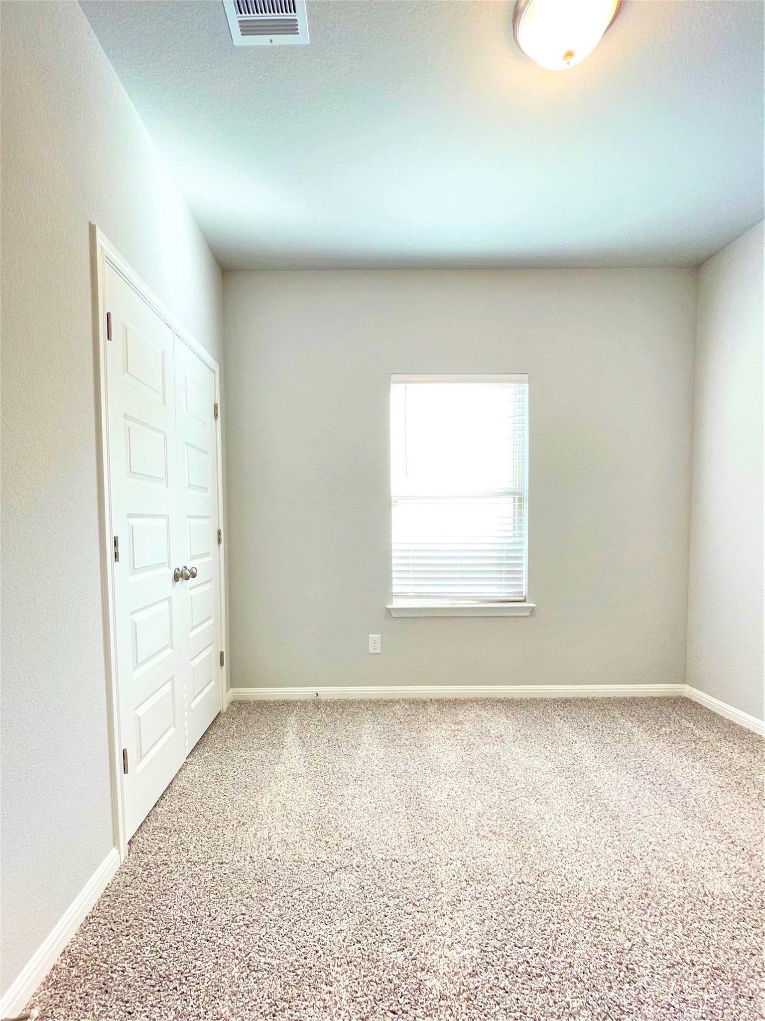 152 Old Stagecoach Road Jarrell, TX 76537 - Photo 14 of 21 Empty room featuring light colored carpet and baseboards