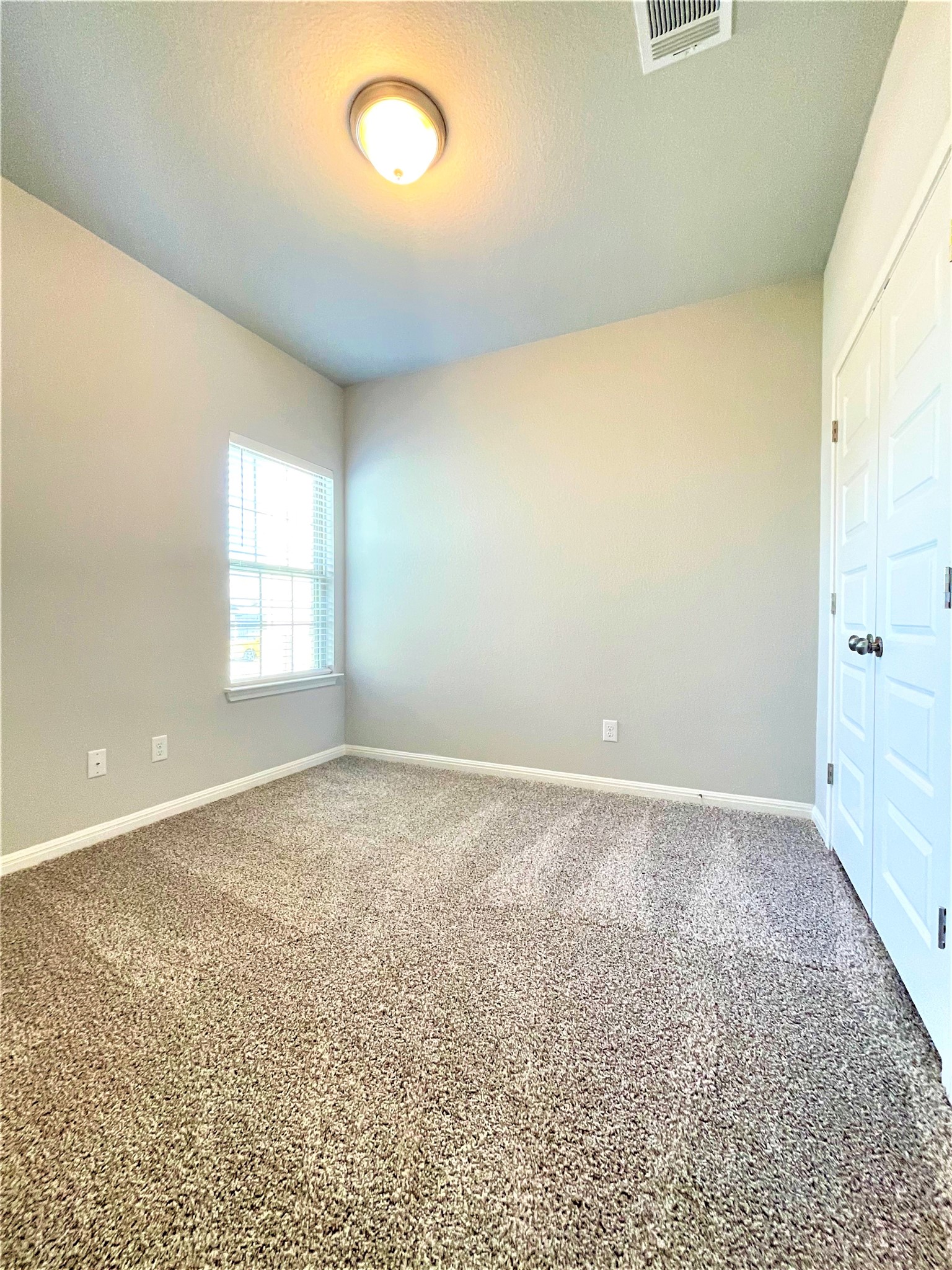 152 Old Stagecoach Road Jarrell, TX 76537 - Photo 15 of 21 Unfurnished bedroom featuring a closet and carpet floors