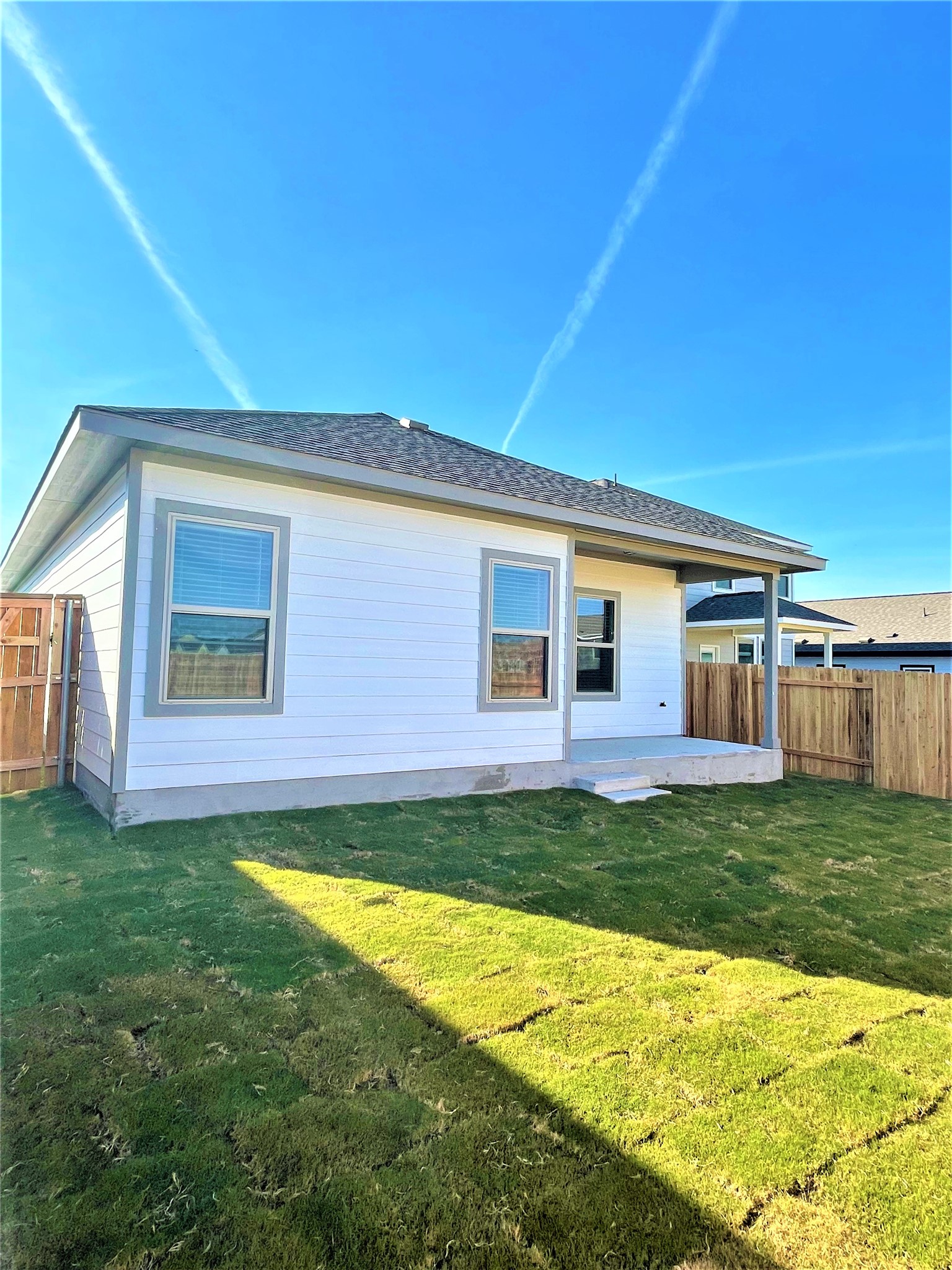 152 Old Stagecoach Road Jarrell, TX 76537 - Photo 17 of 21 Rear view of property featuring a fenced backyard and a patio