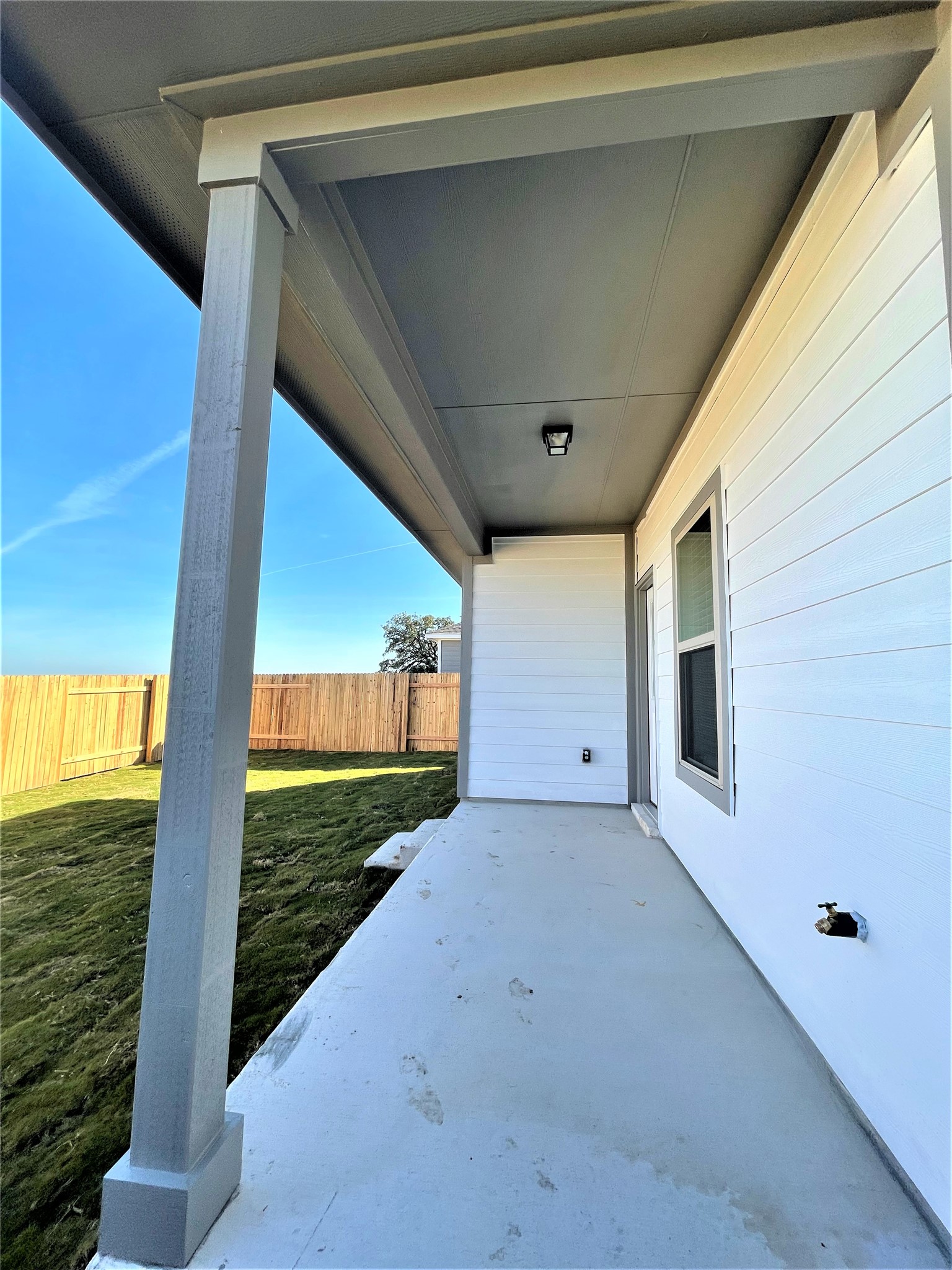152 Old Stagecoach Road Jarrell, TX 76537 - Photo 18 of 21 Fenced backyard featuring a patio