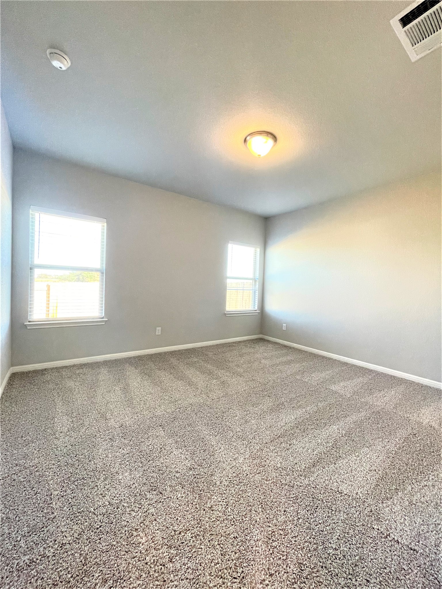 152 Old Stagecoach Road Jarrell, TX 76537 - Photo 9 of 21 Unfurnished room with baseboards and carpet flooring