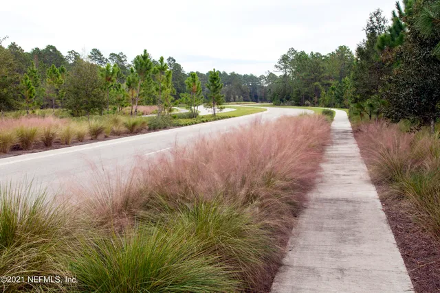 a view of a lake with a yard