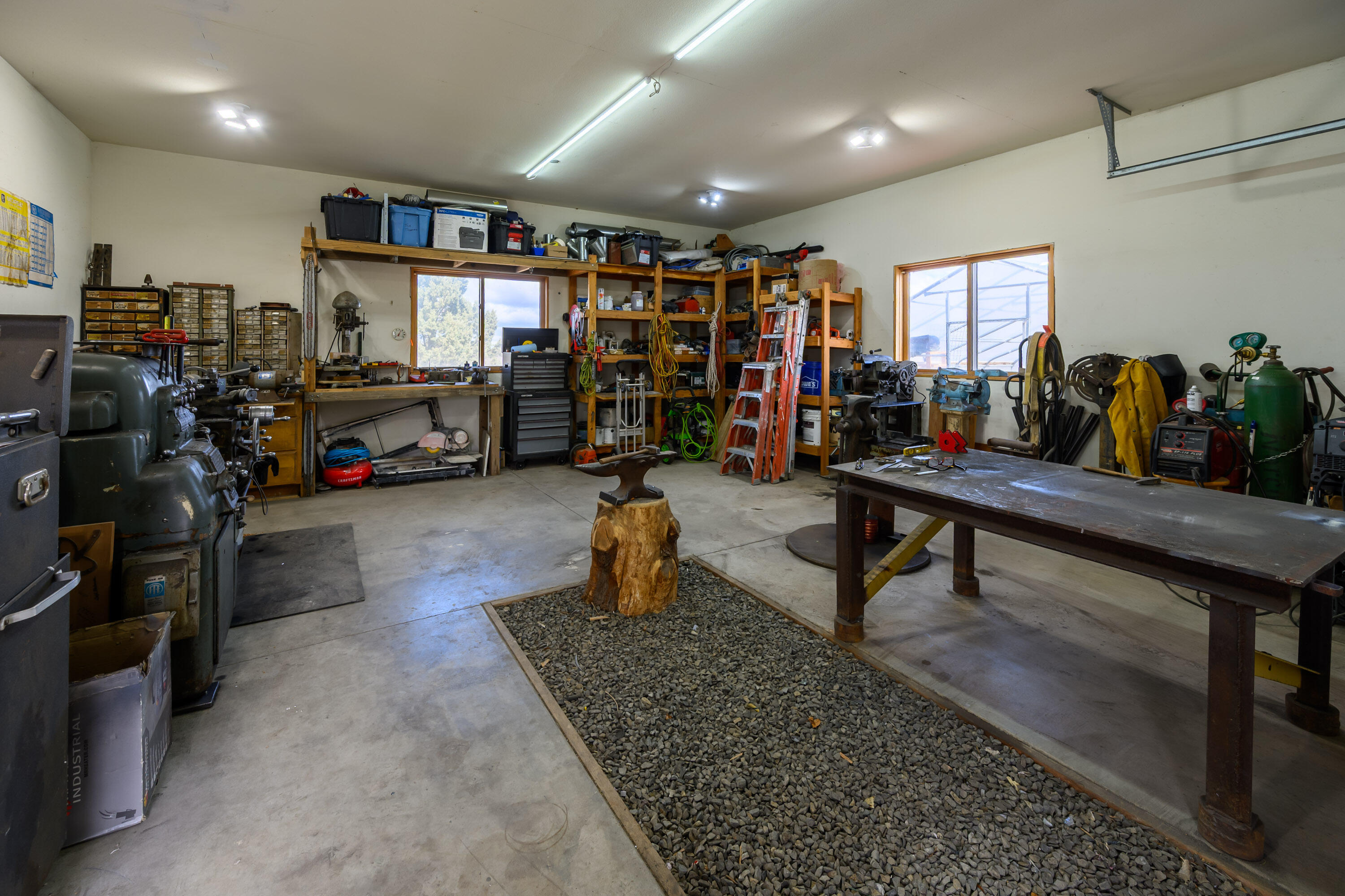 66360 Jericho Road Bend, OR 97703 - Photo 47 of 100 a living room with lots of furniture and lots of furniture