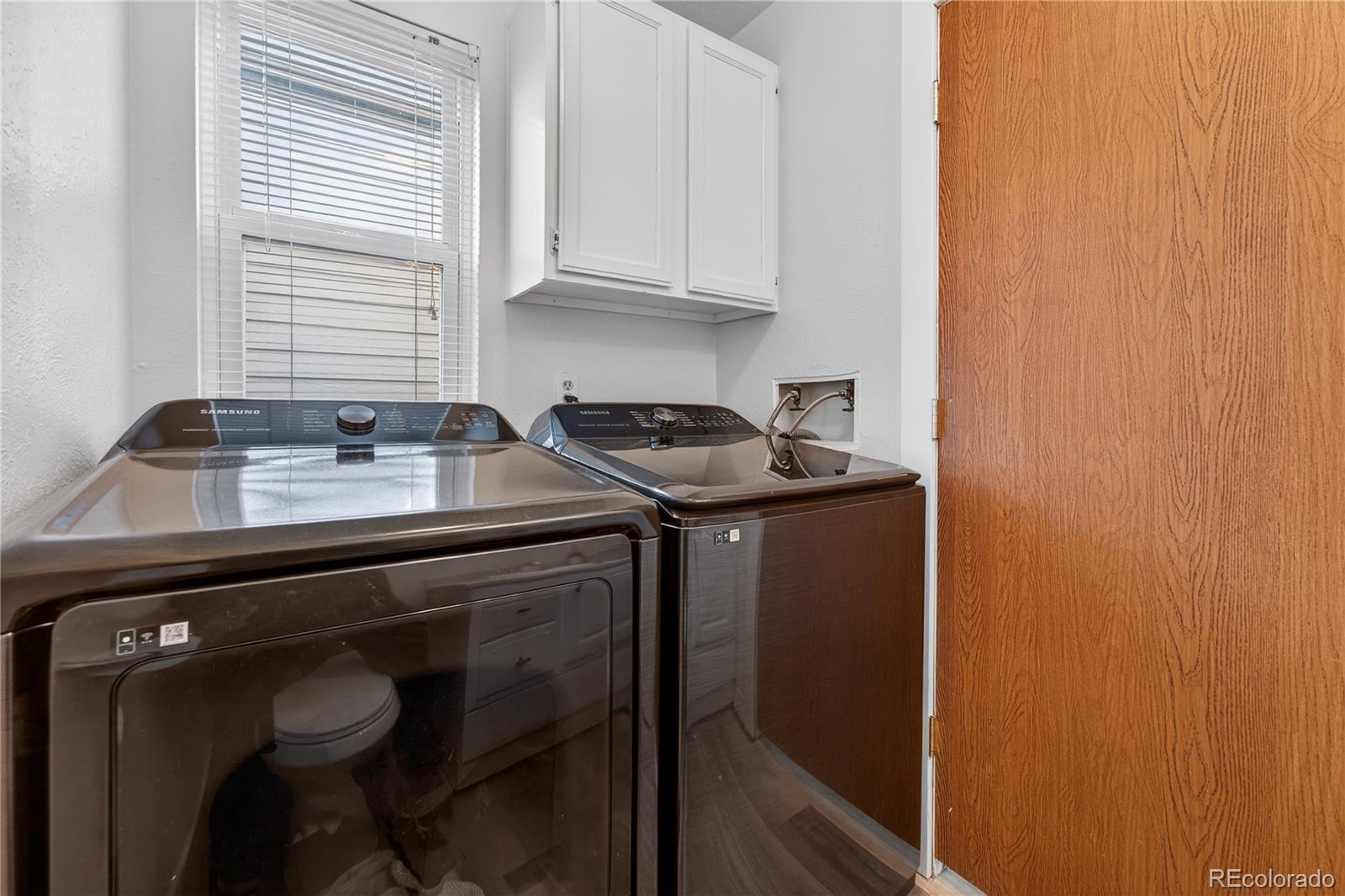 4730 Granby Way Denver, CO 80239 - Photo 15 of 27 a kitchen with a sink and cabinets