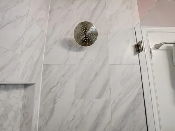 a bath room with a sink and a mirror