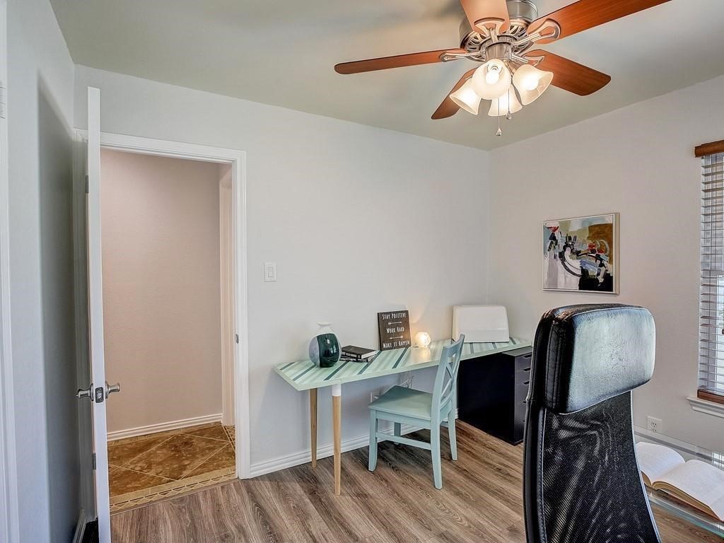 12909 Modena Trail Austin, TX 78729 - Photo 16 of 26 a view of a dining room with furniture and wooden floor