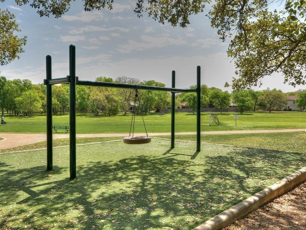 12909 Modena Trail Austin, TX 78729 - Photo 24 of 26 a view of a park with swings