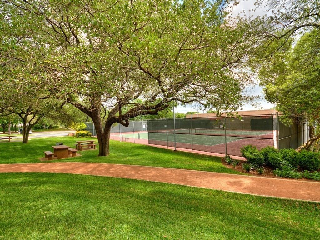 12909 Modena Trail Austin, TX 78729 - Photo 25 of 26 a view of a backyard with large trees