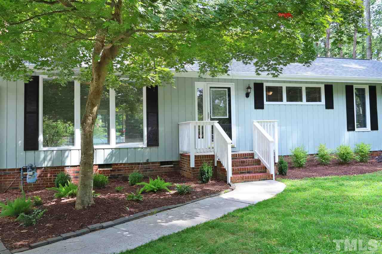 4101 Stranaver Place Raleigh, NC 27612 - Photo 2 of 27 Inviting front porch and freshly landscaped yard.