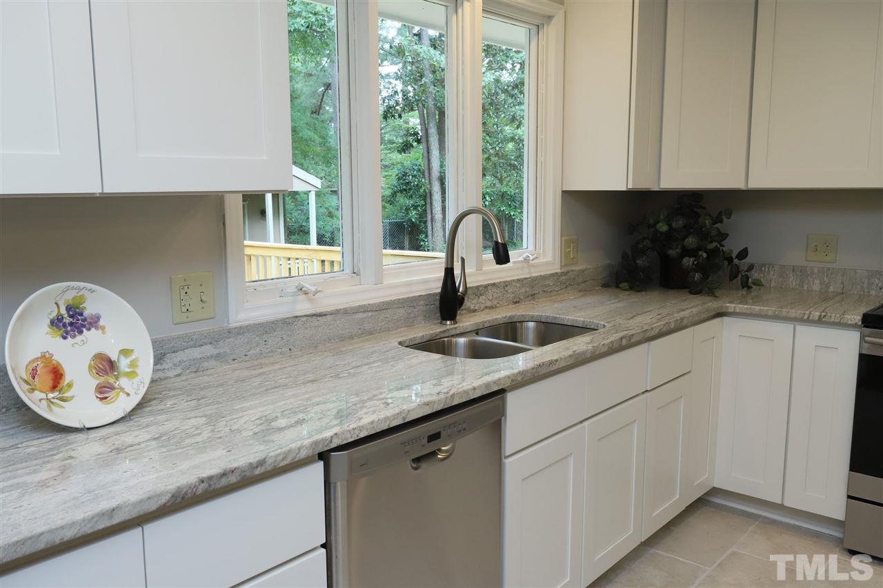 4101 Stranaver Place Raleigh, NC 27612 - Photo 11 of 27 Extensive counterspace for the cook who likes to entertain or just for family.