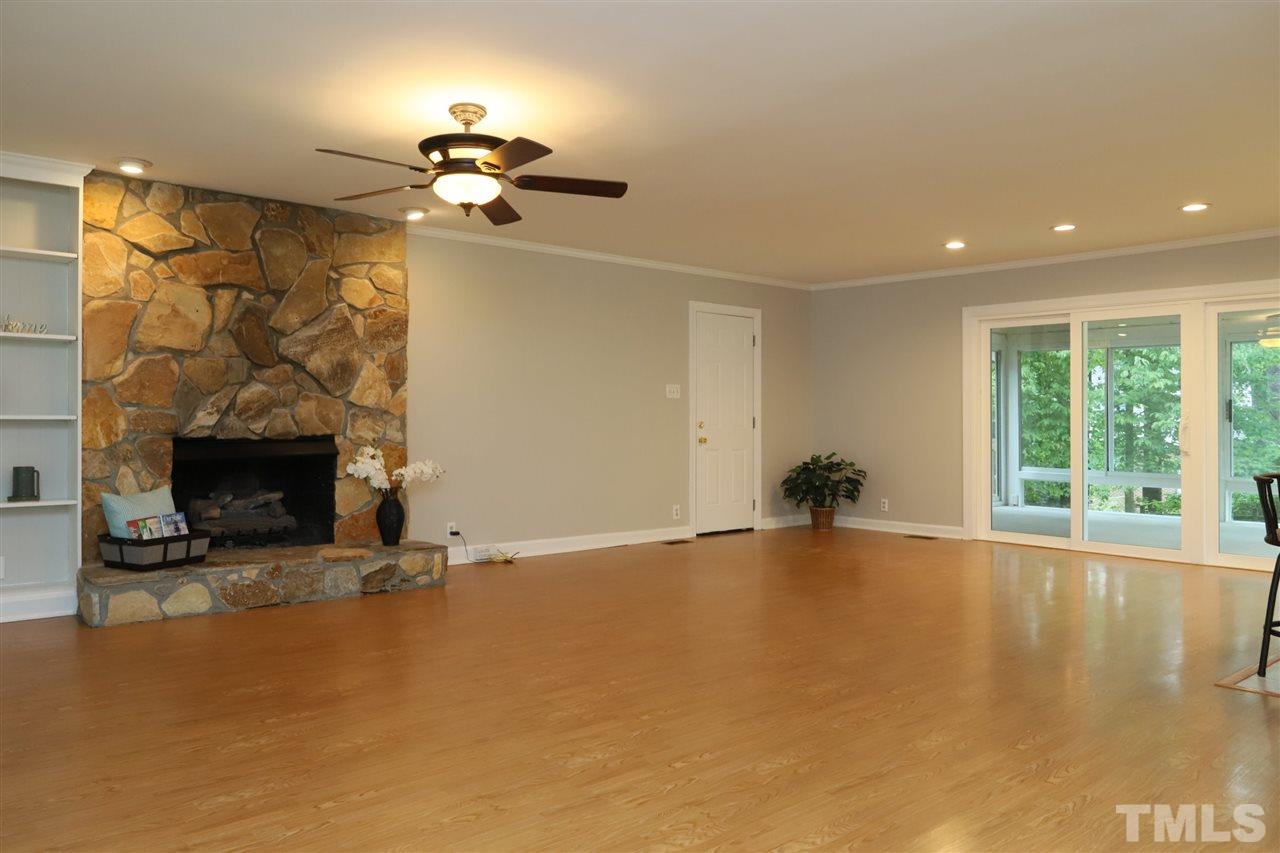 4101 Stranaver Place Raleigh, NC 27612 - Photo 5 of 27 View of living room looking into dining area and sunroom.
