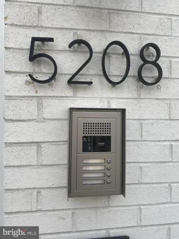 a bathroom with a granite countertop cabinets and a stove