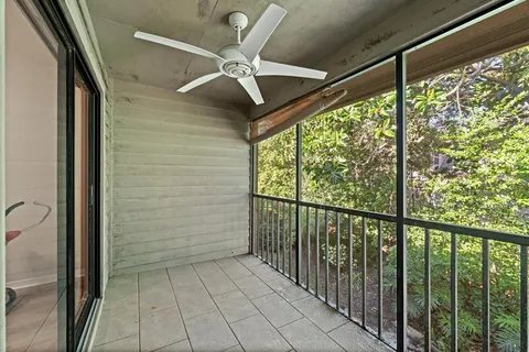 a view of a hallway with a window