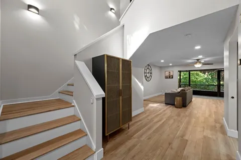 a kitchen with stainless steel appliances a refrigerator and microwave