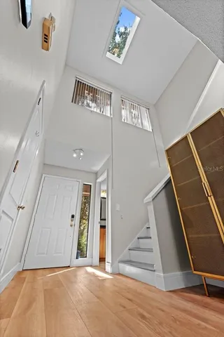 a view of entryway with wooden floor