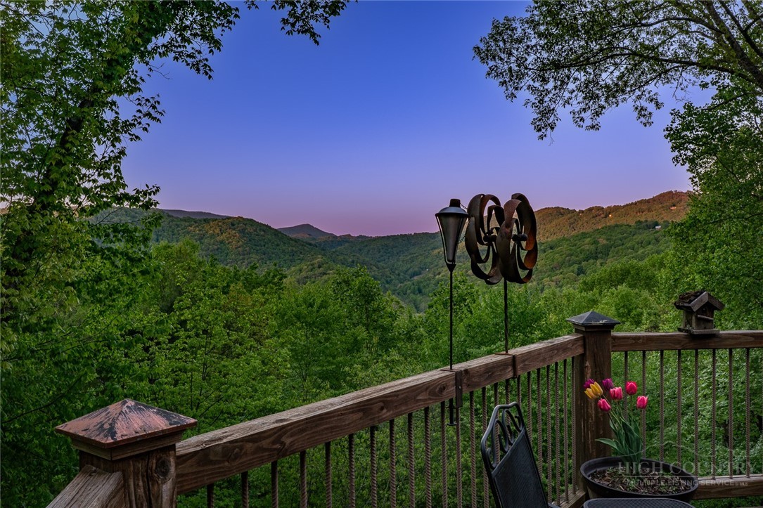 171 Camp Davis Road Banner Elk, NC 28604 - Photo 47 of 48 a view of a balcony and a yard