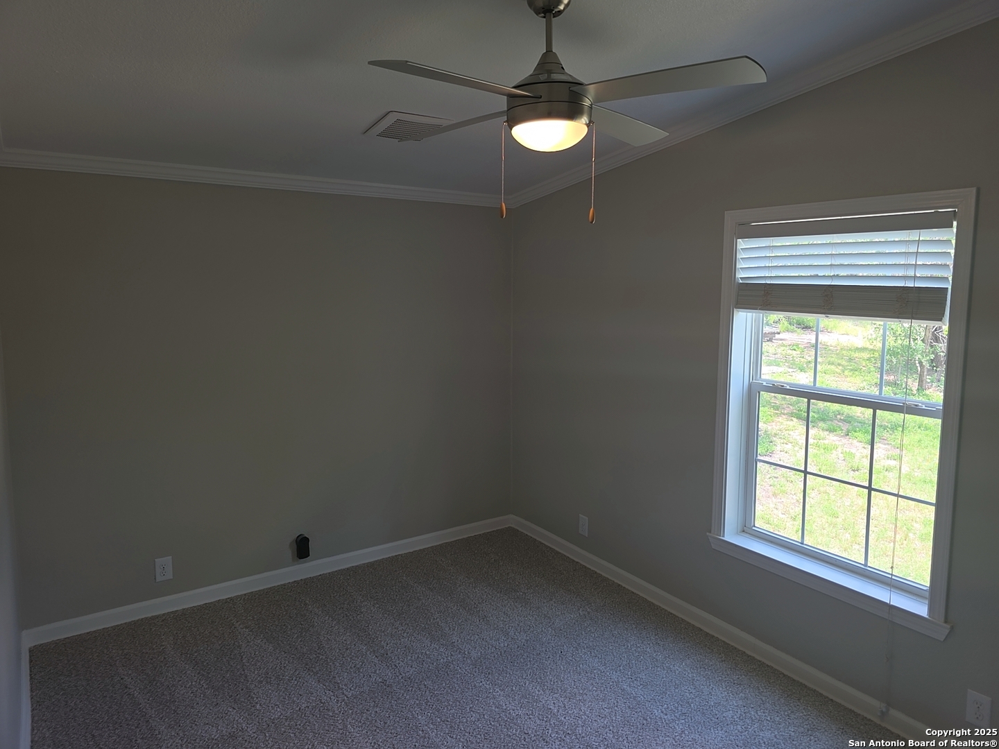 7940 County Road 279 Rio Medina, TX 78066 - Photo 26 of 33 an empty room with a window