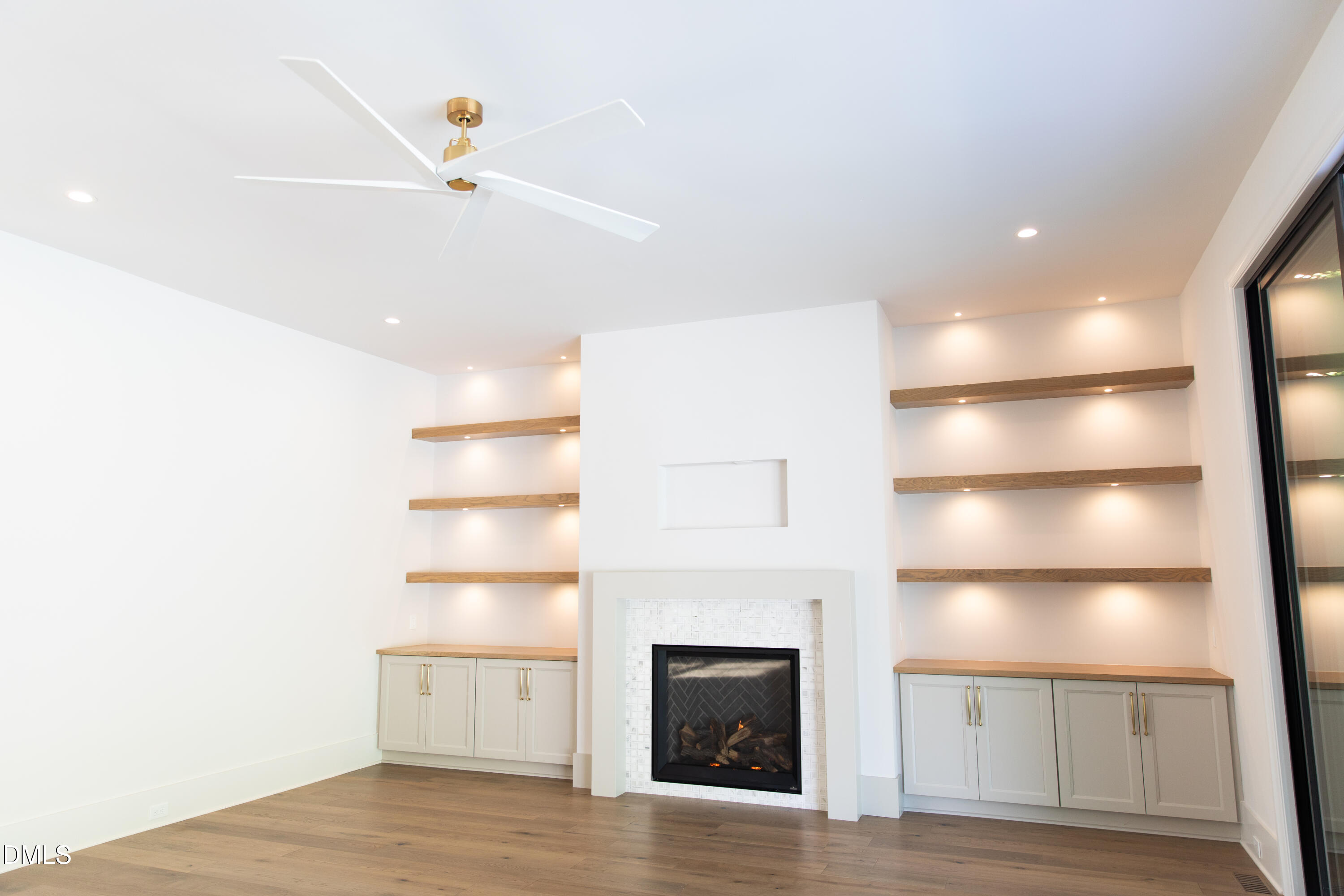 7425 Grist Mill Road Raleigh, NC 27615 - Photo 28 of 57 a view of a fireplace in a room
