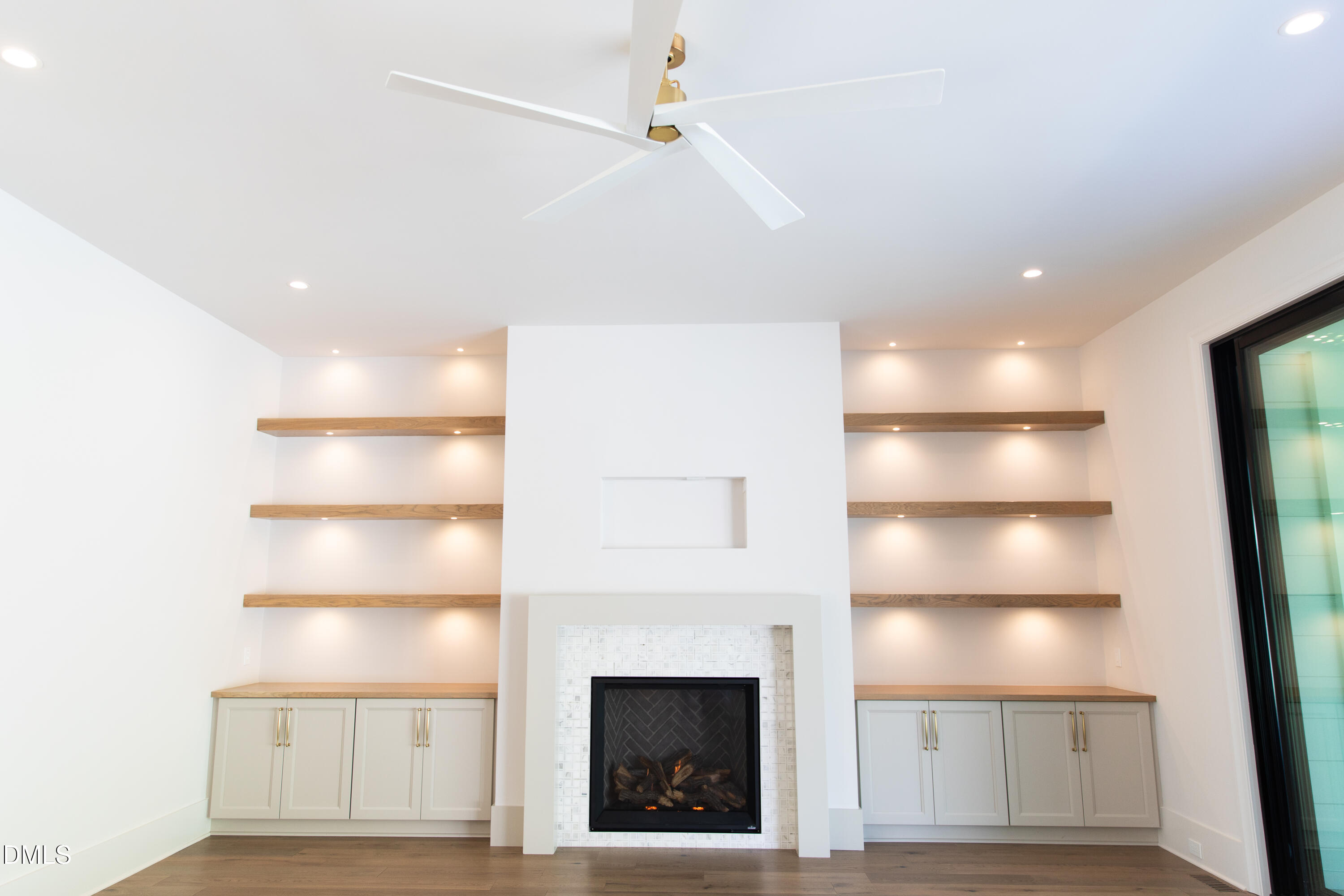 7425 Grist Mill Road Raleigh, NC 27615 - Photo 29 of 57 a view of a livingroom with a fireplace