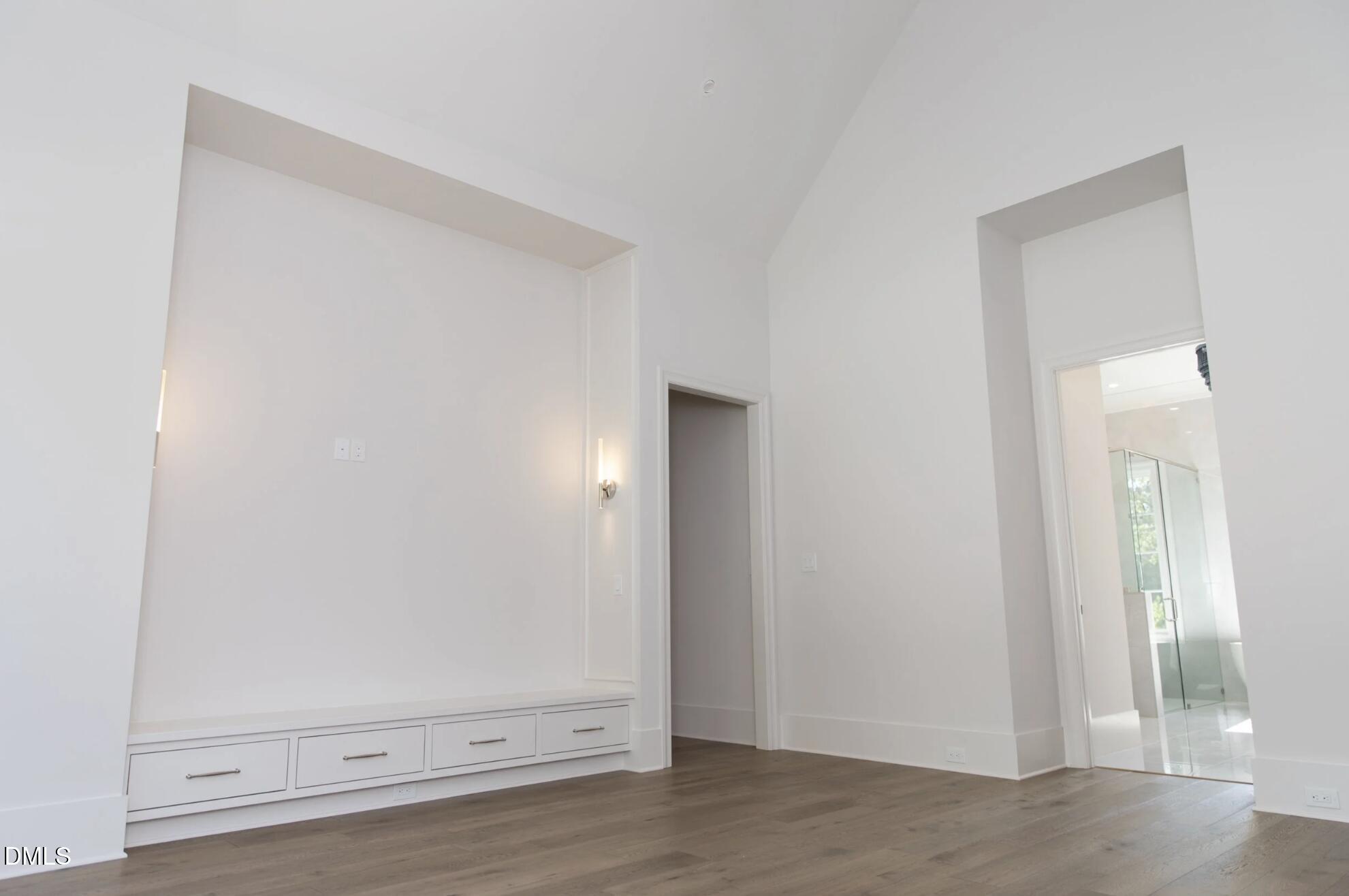 7425 Grist Mill Road Raleigh, NC 27615 - Photo 32 of 57 an empty room with wooden floor