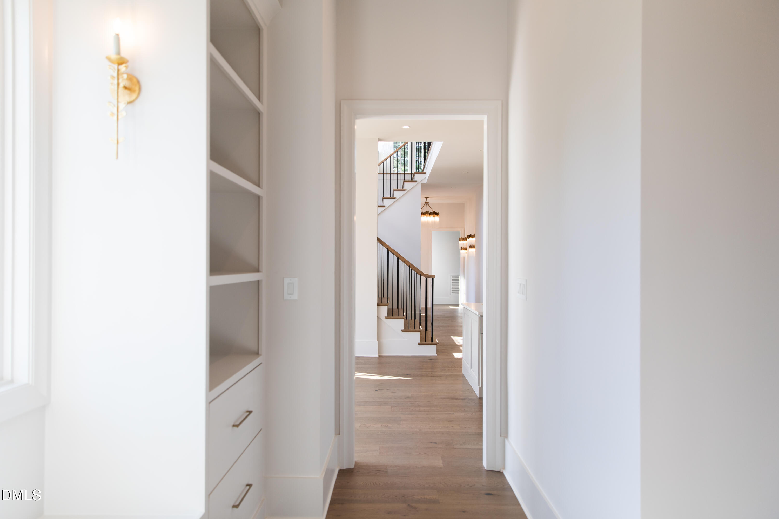7425 Grist Mill Road Raleigh, NC 27615 - Photo 39 of 57 a view of a bathroom from a hallway