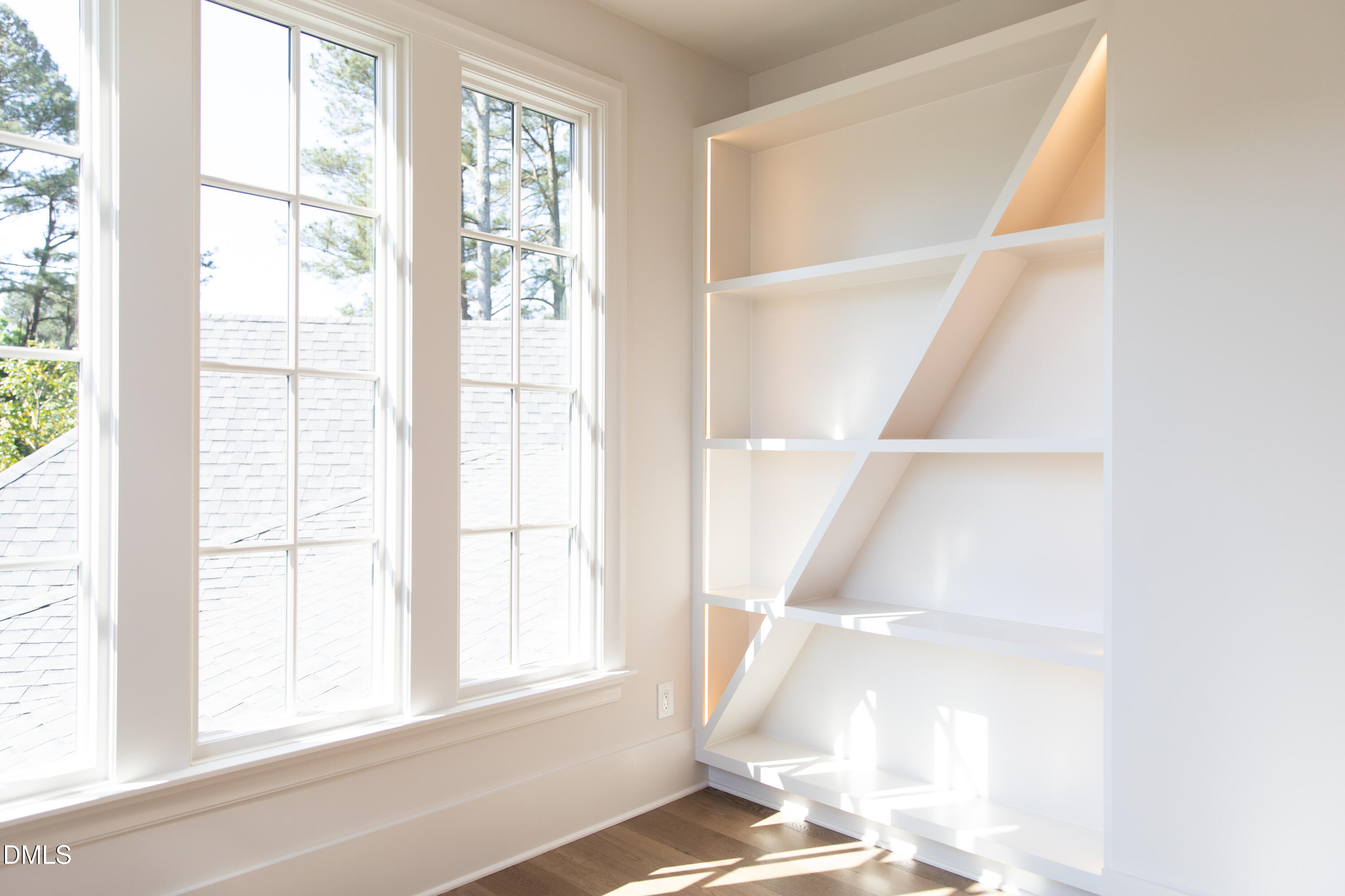 7425 Grist Mill Road Raleigh, NC 27615 - Photo 43 of 57 a view of an empty room with a window
