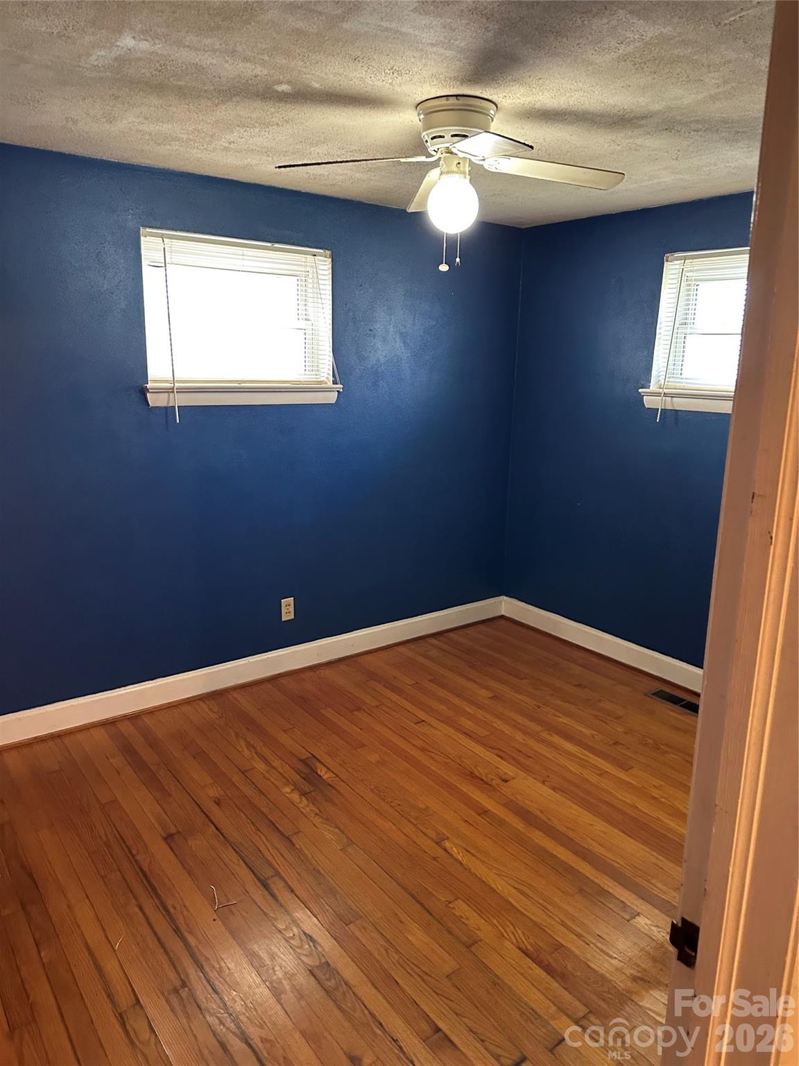 5164 Lavern Street, Unit 1 Conover, NC 28613 - Photo 19 of 28 a view of empty room with wooden floor